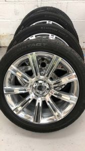 A set of alloy wheels refurbished by Sweeney and Sherlock ready to be fitted back on the car.